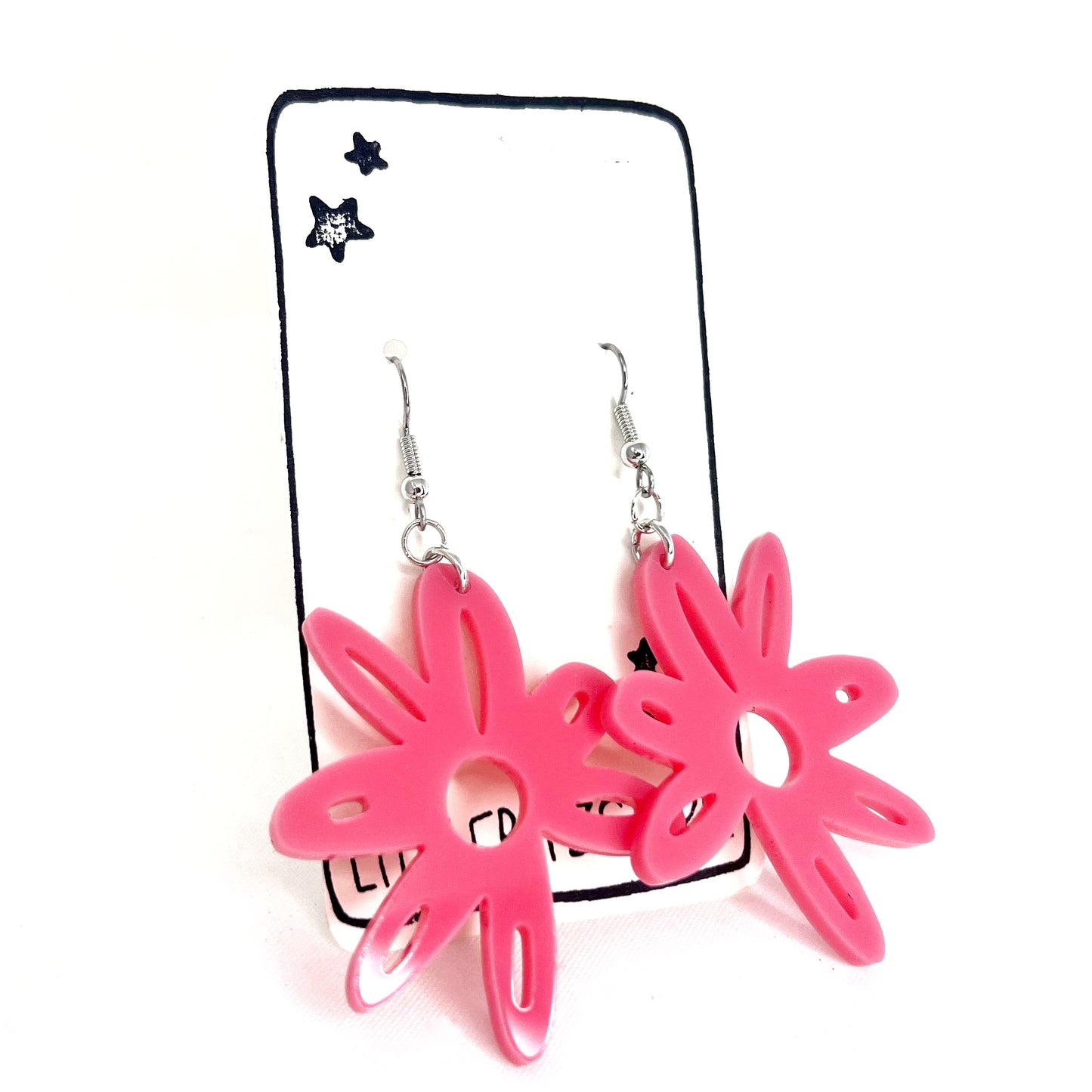 “doodle flower” acrylic earrings - pastel pink - surgical steel