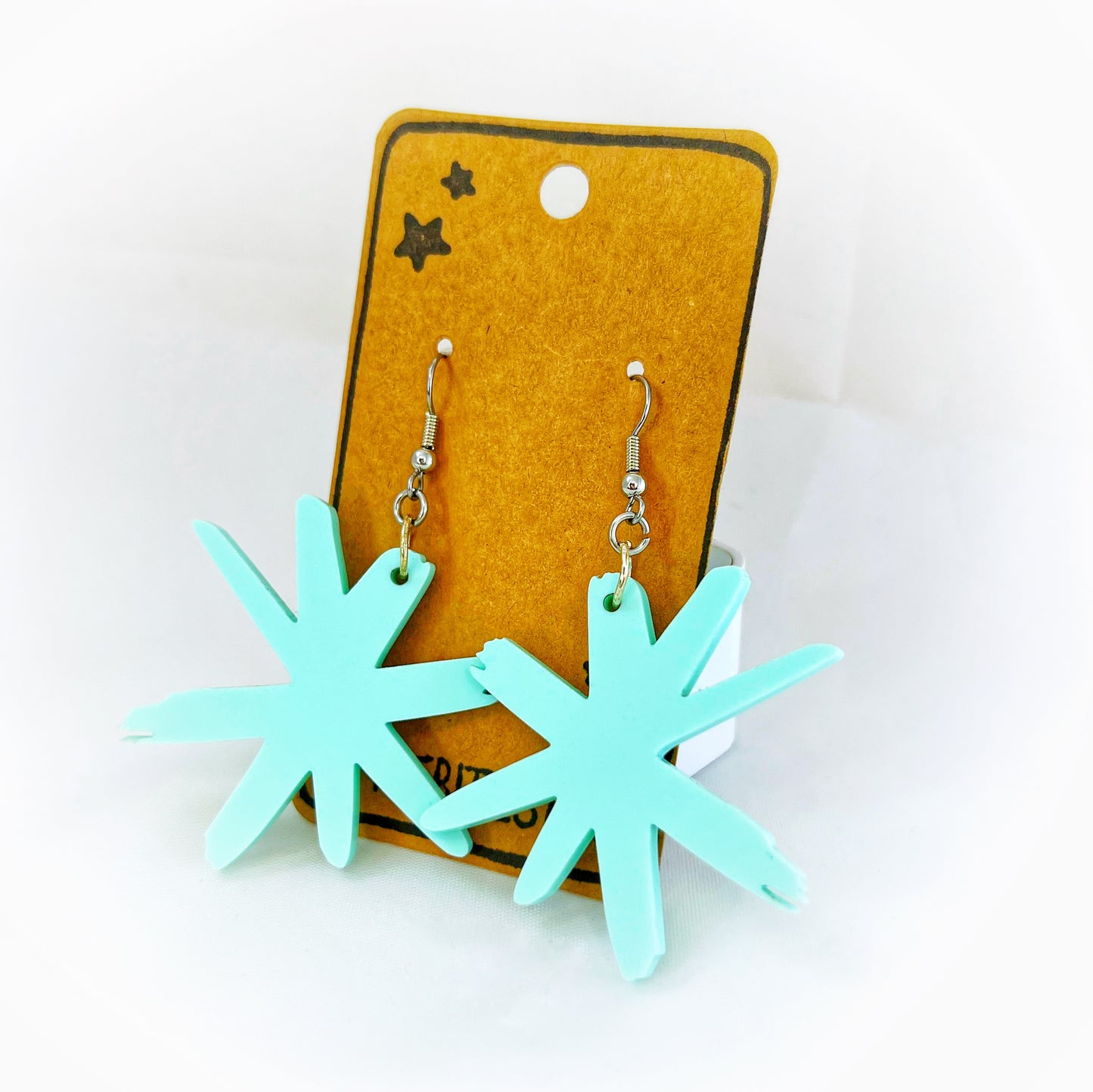“sketchy asterisk” acrylic earrings - pastel blue - surgical steel