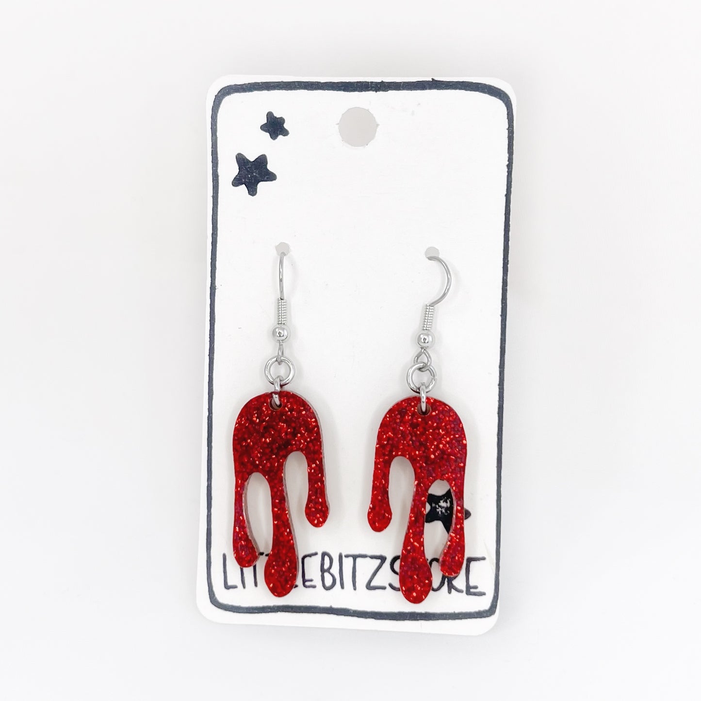 “drippy” acrylic earrings - ruby slipper - surgical steel