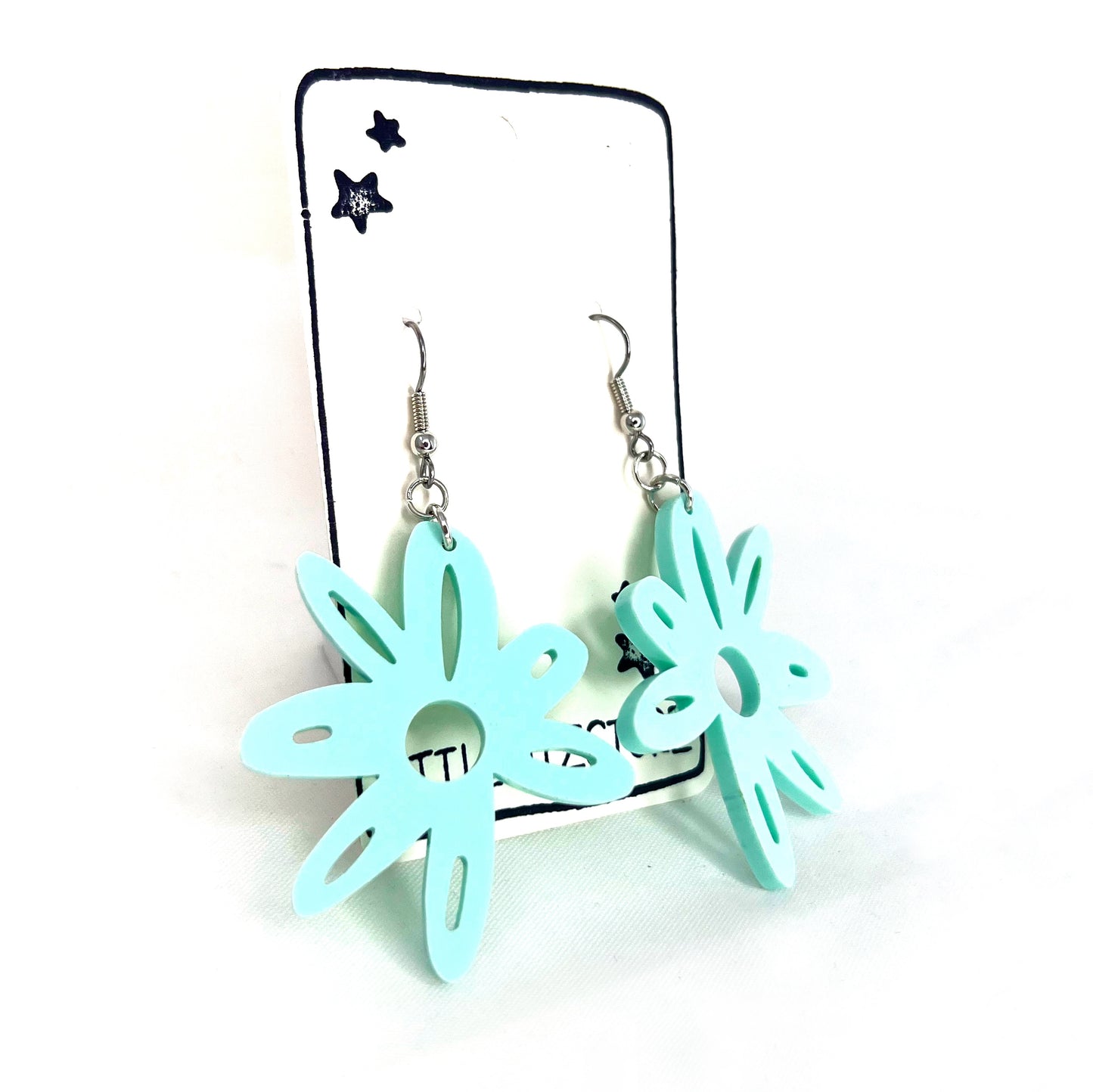 “doodle flower” acrylic earrings - pastel blue - surgical steel